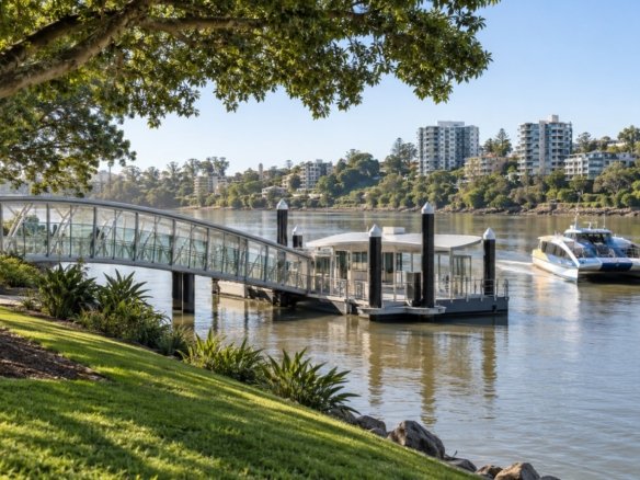 Modern Brisbane River ferry terminal with a CityCat approaching the pontoon