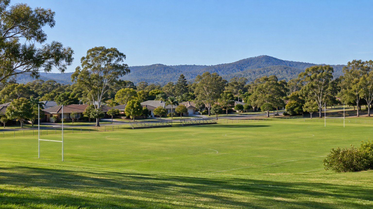 Central Gold Coast suburb with detached homes, sports fields and open green space