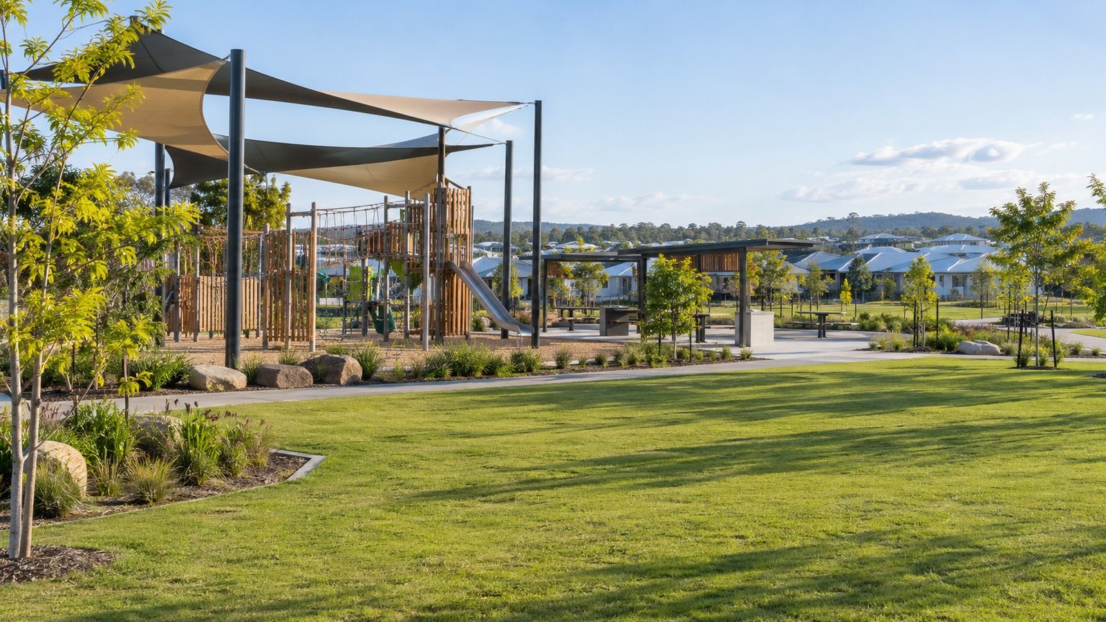District park with playground, shelters and open lawn in a master-planned community