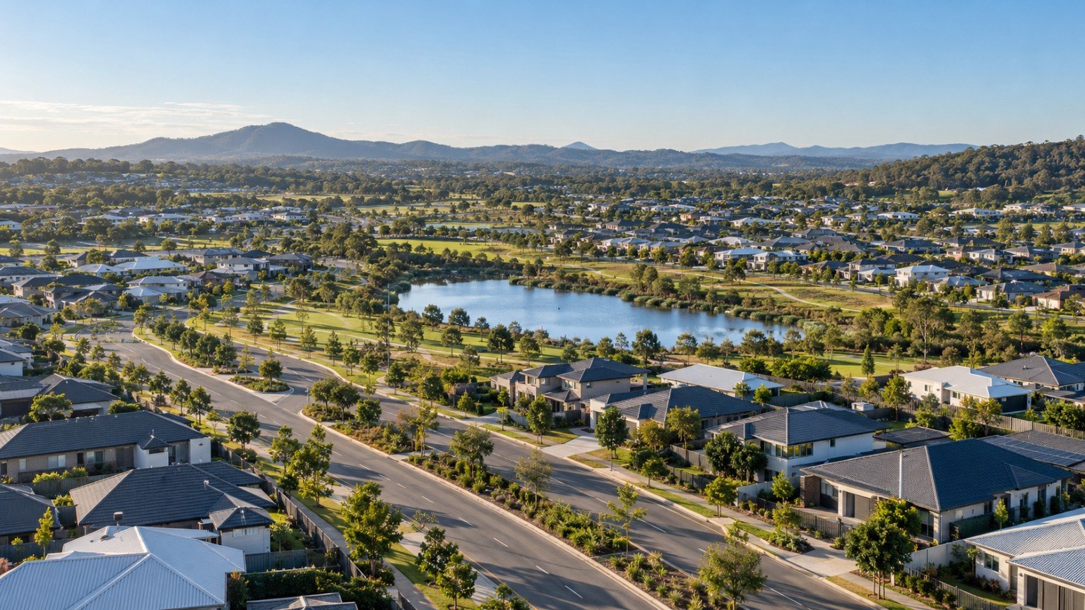 Ipswich growth-corridor housing with contemporary homes, new roads and green open space on rolling terrain