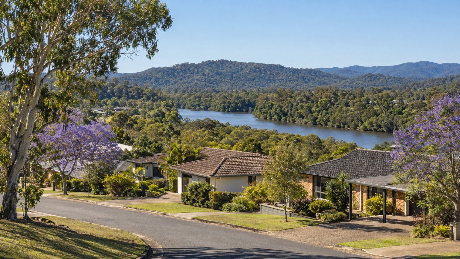 Established Gold Coast hinterland-edge suburb with homes, bushland ridges and a river corridor