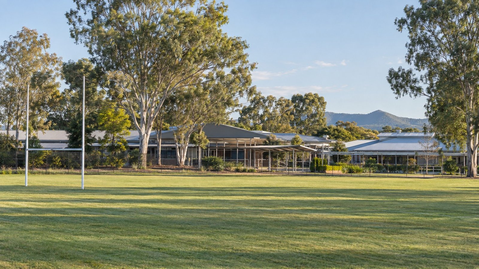 Queensland school grounds with sports field and covered walkway