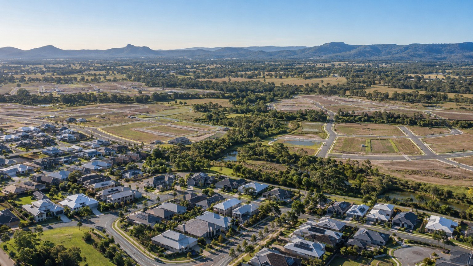 New master-planned housing spreading across rolling terrain in the Ripley Valley west of Brisbane