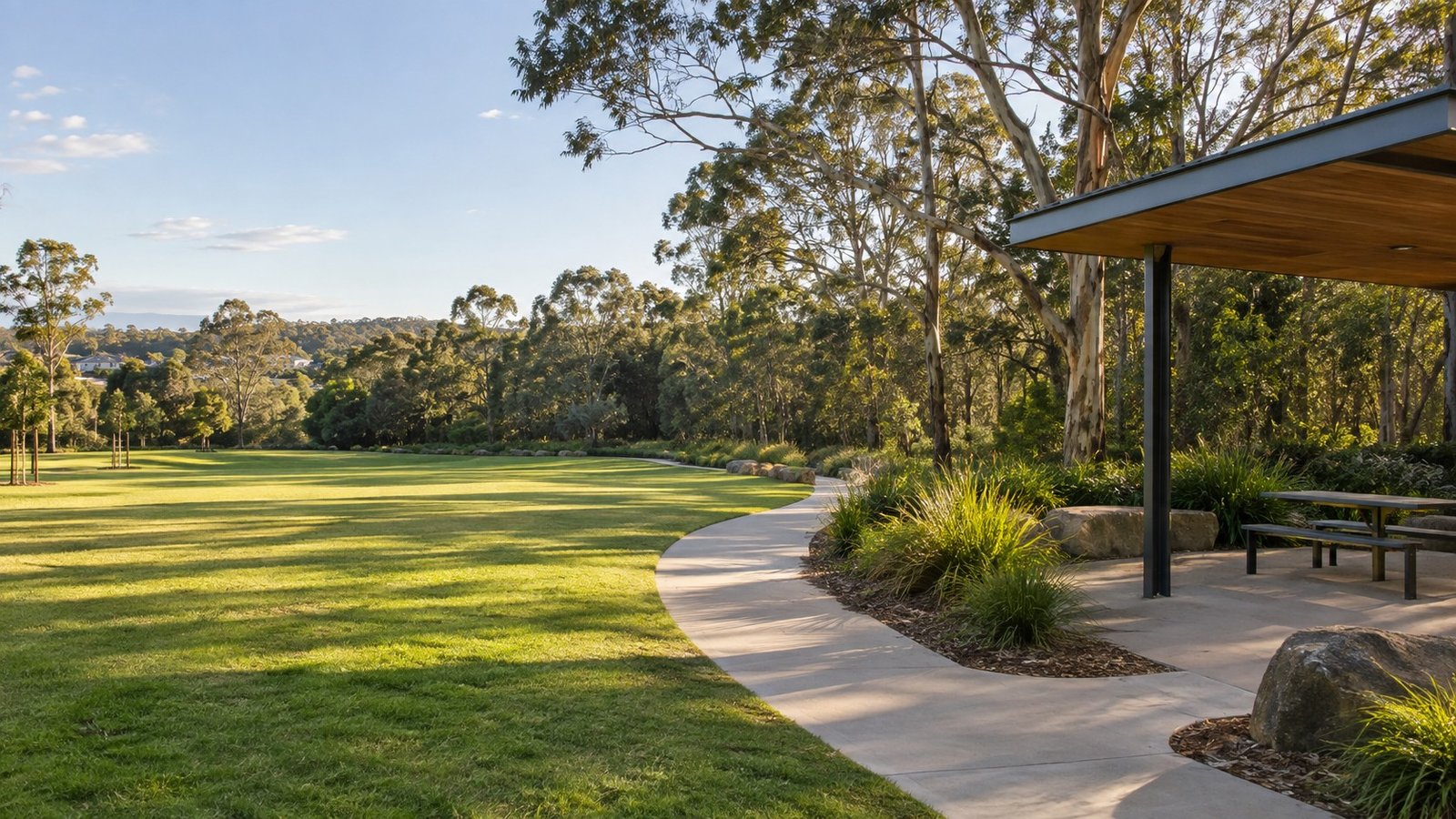 Community parkland with pathways, shelter and a natural bushland edge