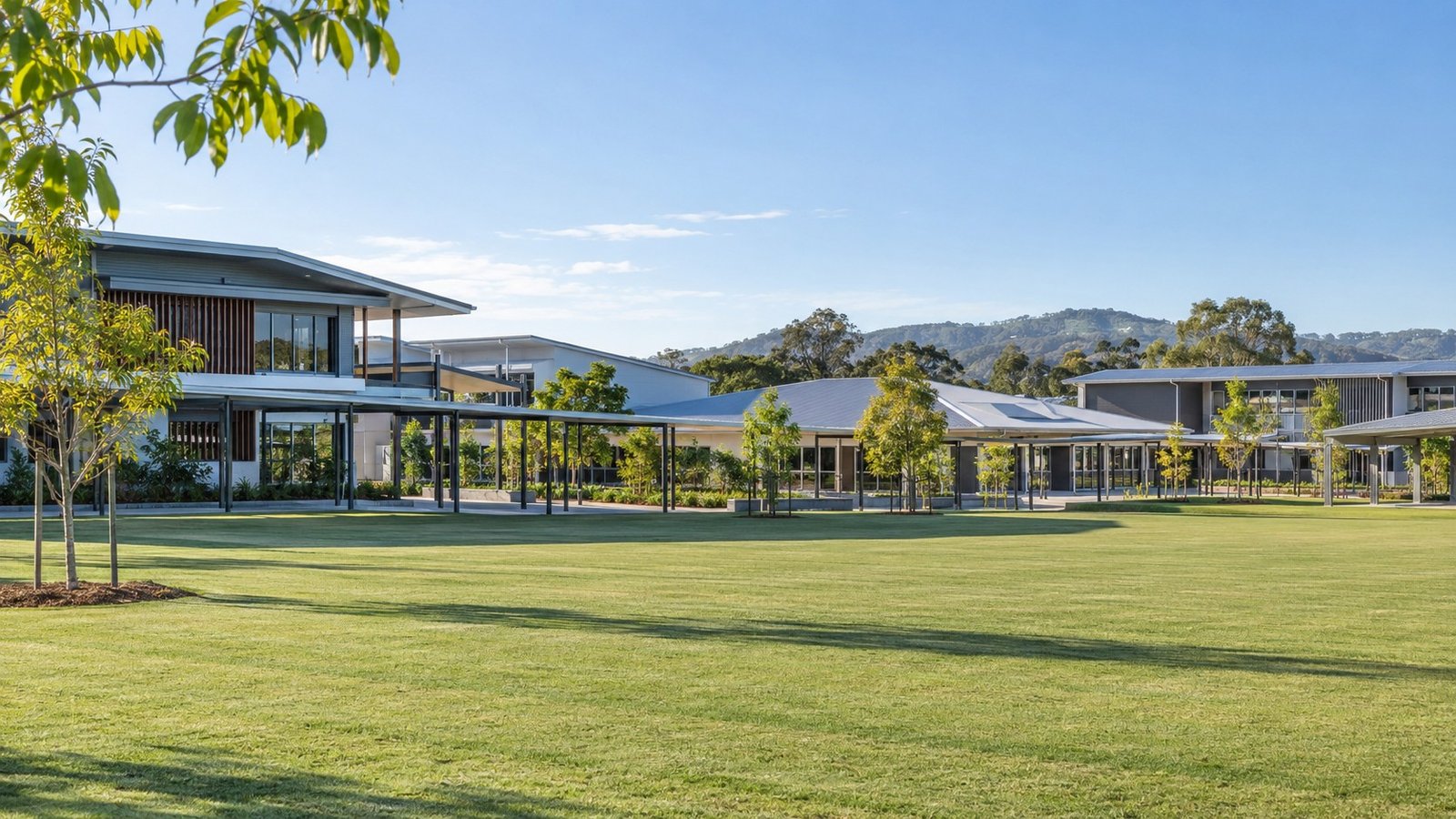Modern school campus with covered walkways in a master-planned Logan community